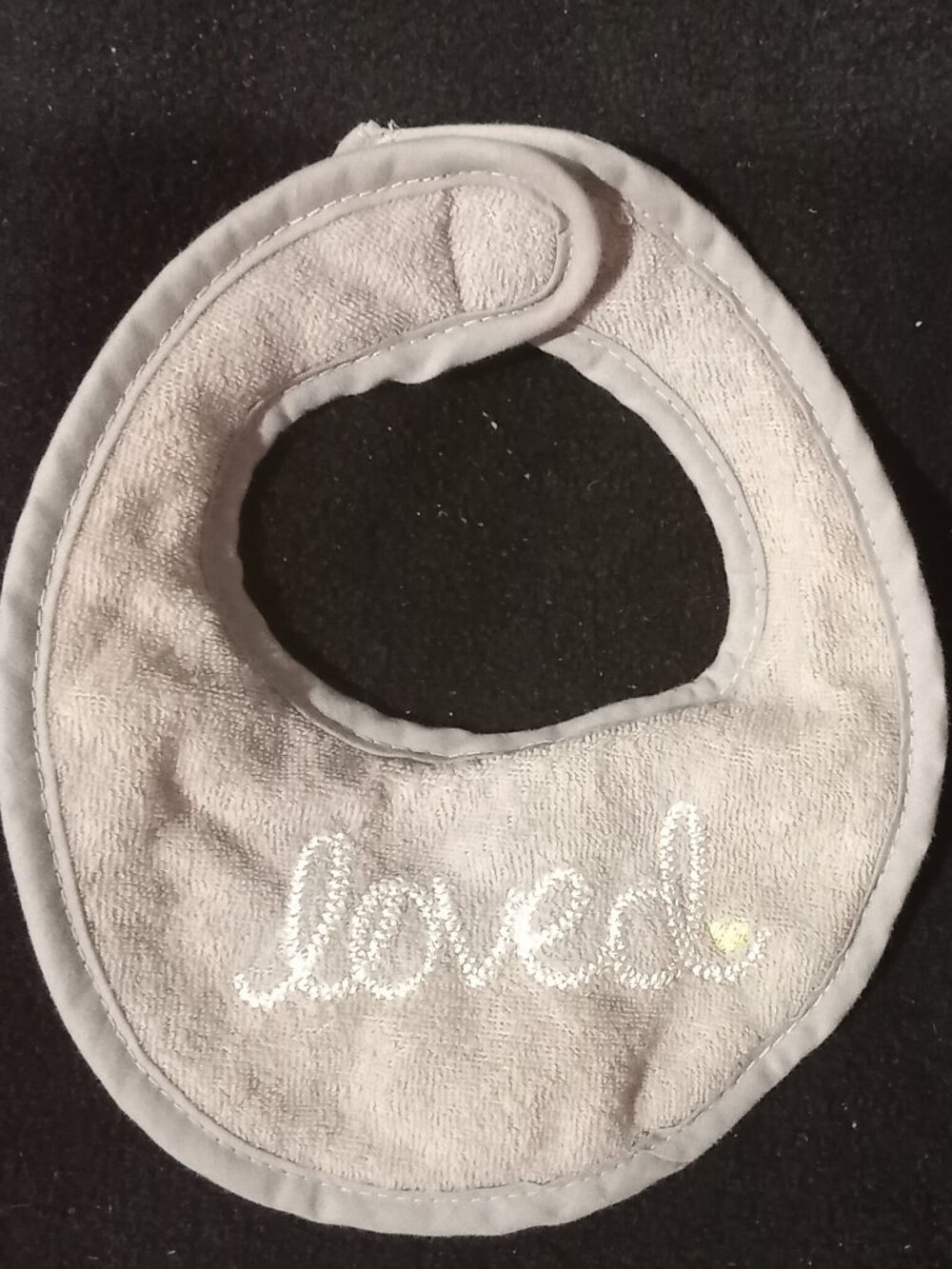 "Loved" Infant bib with Velcro closure